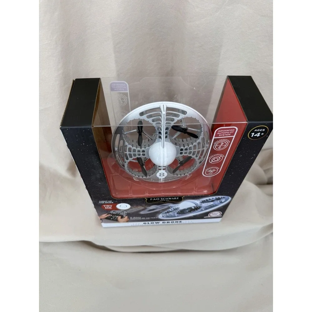 FAO Schwarz Glow Drone Remote Control LED Stunt UFO Drone Lights 360° Flips Gyro